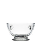 Clear glass mini bowl with a decorative motif holding 9 oz
