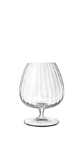 Clear snifter glass with a vertically fluted bowl, short stem and round base