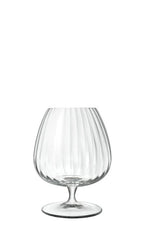 Clear snifter glass with a vertically fluted bowl, short stem and round base