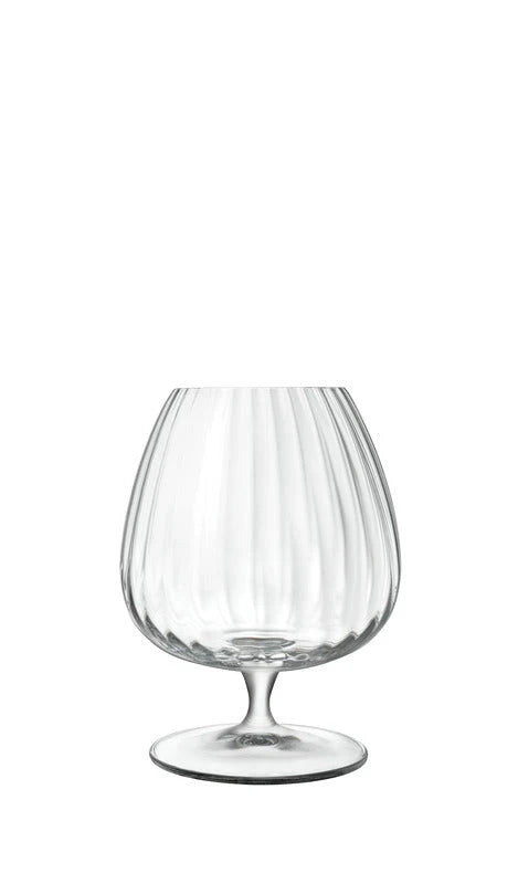 Clear snifter glass with a vertically fluted bowl, short stem and round base