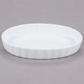 White oval shallow dish with fluted outer sides