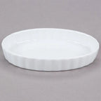 White oval shallow dish with fluted outer sides