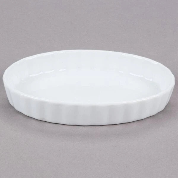 White oval shallow dish with fluted outer sides